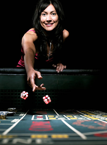 Dealer revealing community cards in Texas Hold'em Bonus game